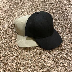 Black and cream baseball caps, plain